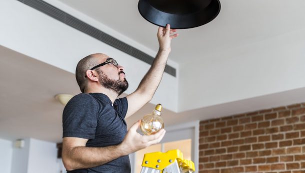Man changing lightbulb